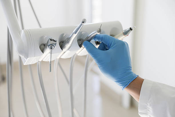 Professional Tooth Extraction technician working in Caddo County County, OK